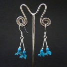 IO011 Indianerschmuck Ohringe mit 2 Türkis Delfinen